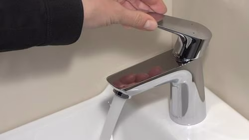 Hansgrohe TALIS E 80 monoknop wastafelmengkraan met waste 15 mm diameter en G 1 1/4" Baduitloop chroom