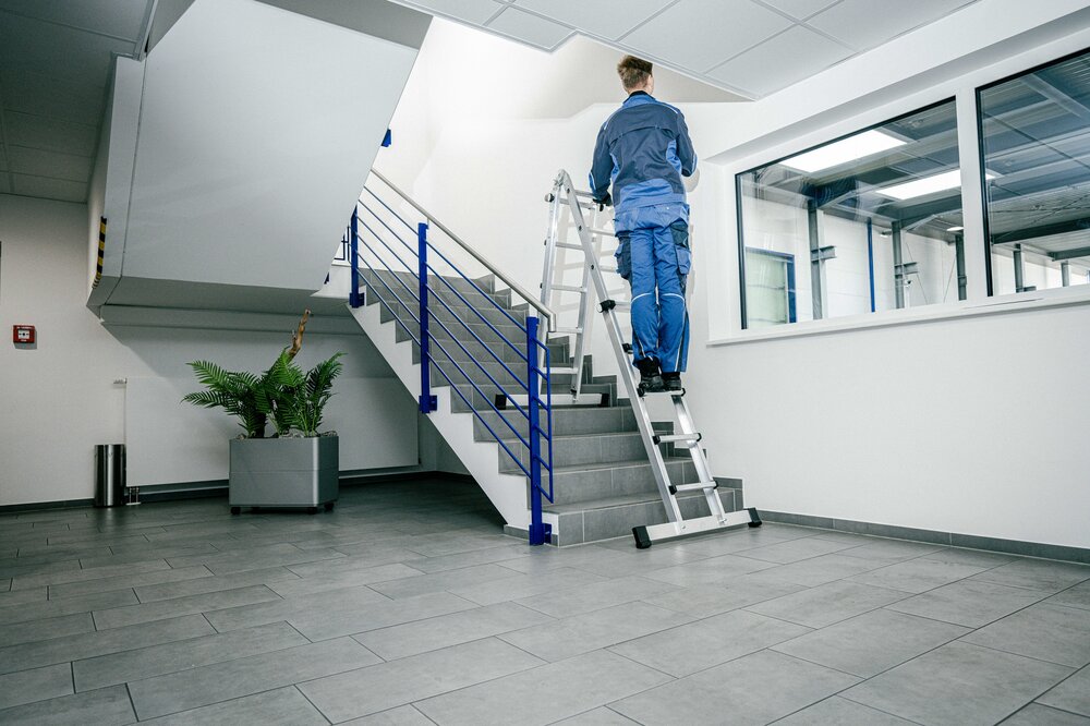 Munk telescoopladder 4-delig met dwarsbalk 4x3 sporten